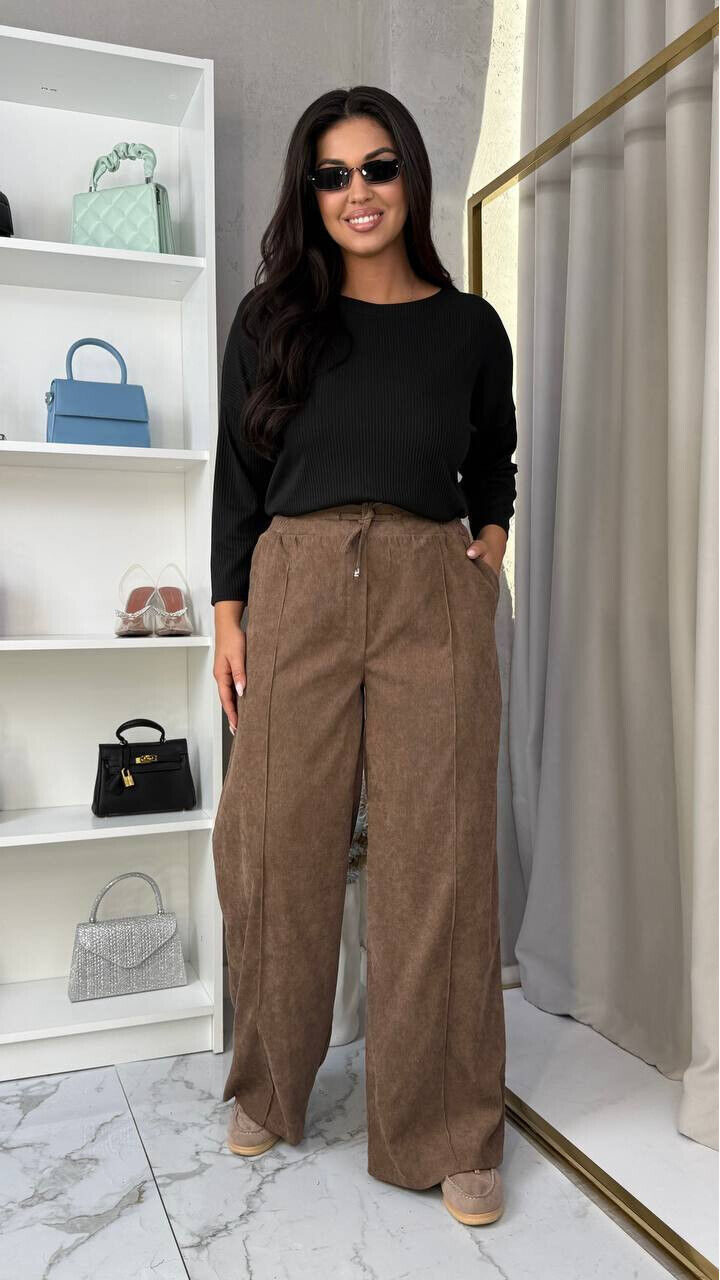 Брюки высокой посадки с косыми карманами