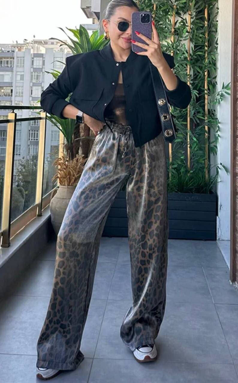 Шикарні леопардові брюки фото