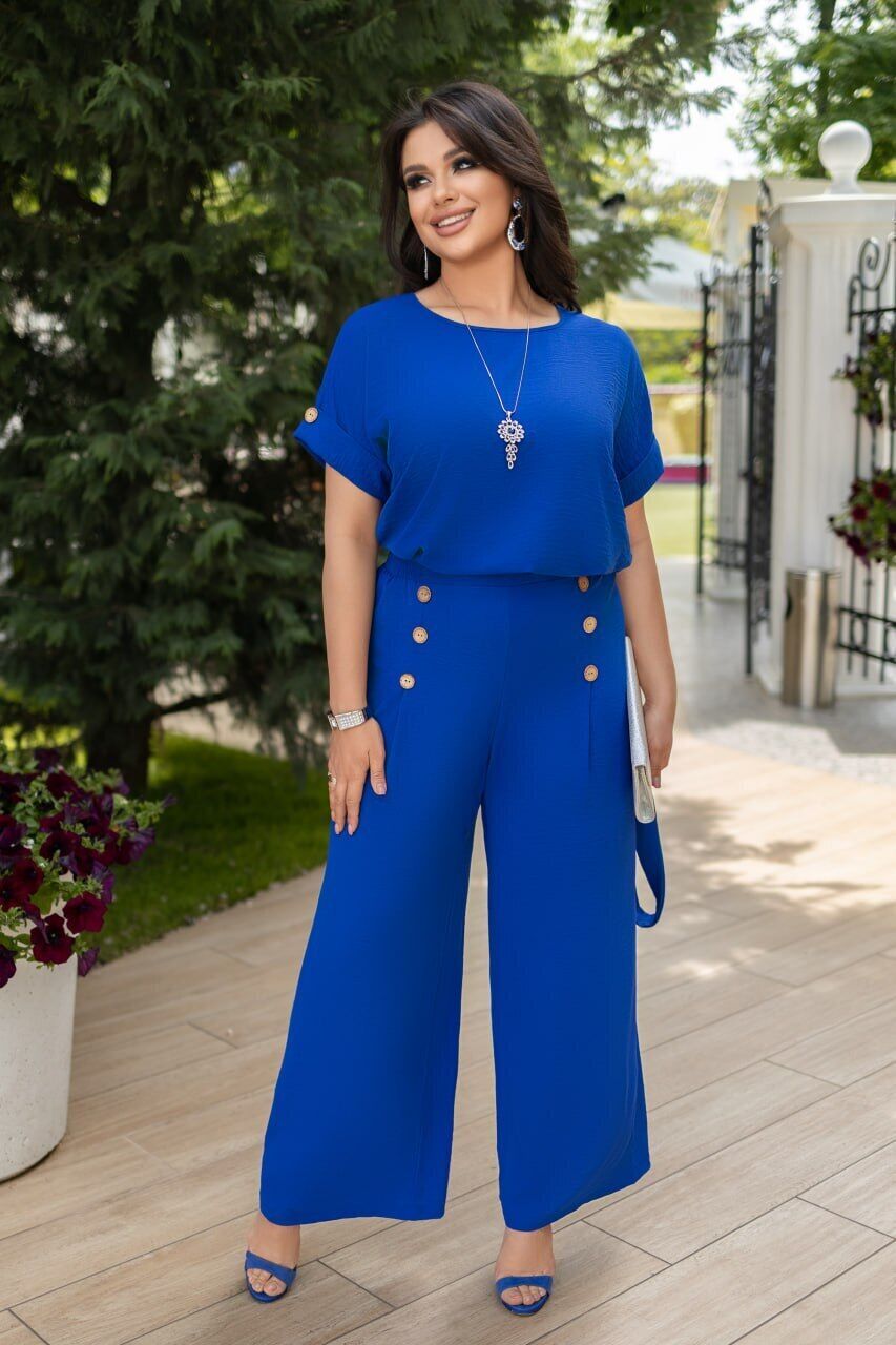 Літній зручний жіночий брючний костюм фото