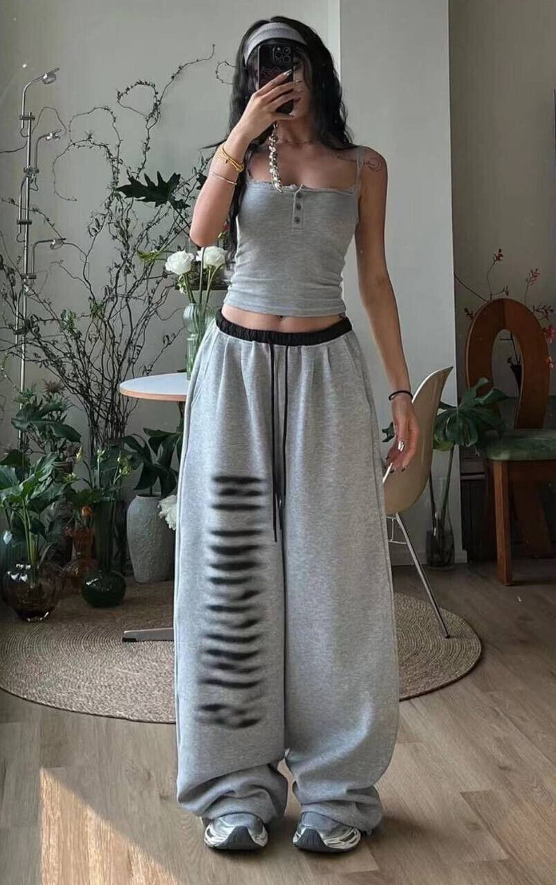 Стильні сірі штани oversize з трендовим принтом збоку 